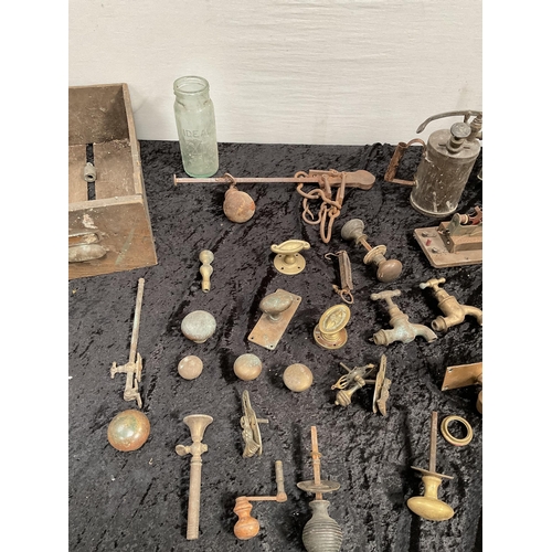 382 - BOX OF BRASSWARE TO INCLUDE BLOW LAMPS, STILYARDS, FLAT IRON, VICTORIAN BRASS DOOR FURNITURE, TAPS E... 