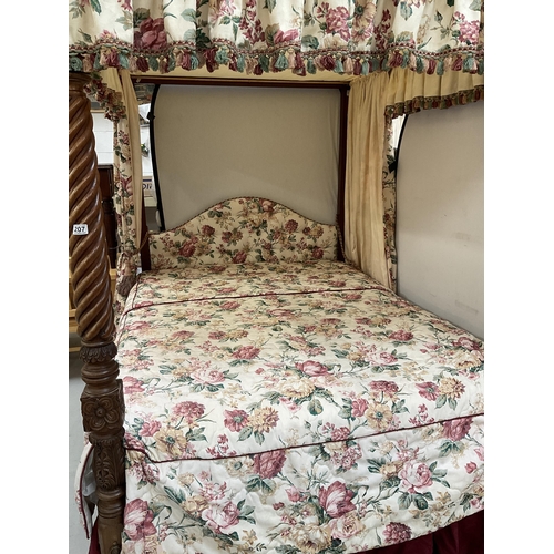 222 - MAHOGANY HEAVILY CARVED FOUR POSTER BED C/W SPIRAL DESIGN FLY AWAY  MAHOGANY CORNICE FLORAL UPHOLSTE... 