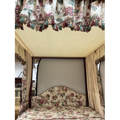 222 - MAHOGANY HEAVILY CARVED FOUR POSTER BED C/W SPIRAL DESIGN FLY AWAY  MAHOGANY CORNICE FLORAL UPHOLSTE... 