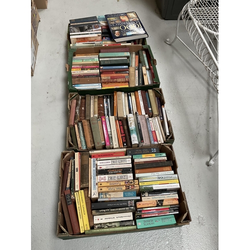 31 - 4 BOXES OF PAPERBACK BOOKS