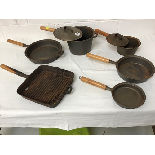 51 - BOX OF CAST IRON SAUCEPANS