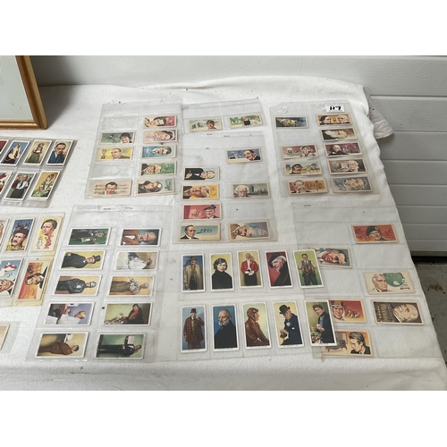 117 - SELECTION OF CIGARETTE CARDS TO INCLUDE FRAMED EXAMPLES