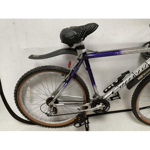 171 - CARRERA ALUMINIUM 7000 SERIES MOUNTAIN BIKE C/W SPARE SADDLE , MUD GUARDS, HELMET, PUMP ETC