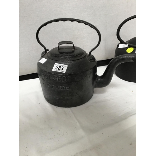 283 - 2 HEAVY CAST IRON KETTLES