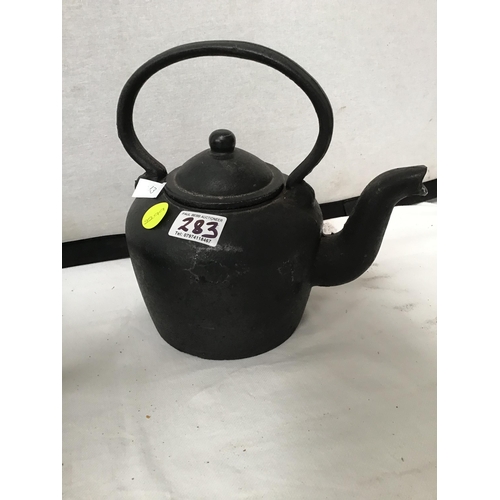 283 - 2 HEAVY CAST IRON KETTLES