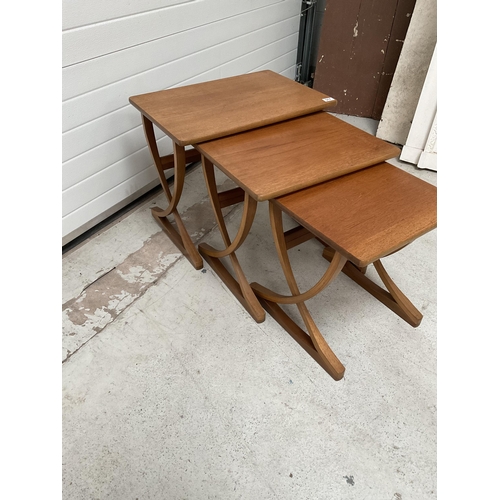 317 - RETRO TEAK NEST OF 3 TABLES LABELLED NATHAN FURNITURE