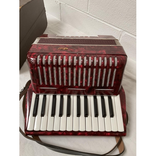 321 - CASED ACCORDIAN