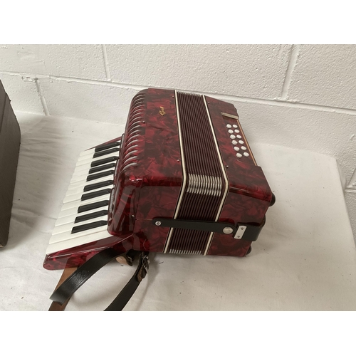 321 - CASED ACCORDIAN