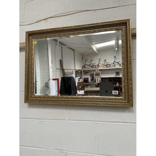 104 - REPRODUCTION GILT FRAMED BEVEL EDGE WALL MIRROR 33 X 24