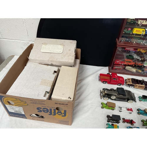 114 - 2 COLLECTORS CABINETS AND COLLECTORS VEHICLES TO INCLUDE YESTERYEAR AND PACKING  BOXES