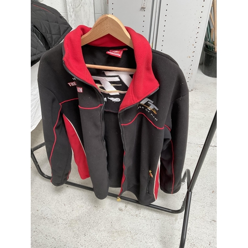 120 - TT ROAD RACING WAISTCOAT AND TT ISLE OF MAN JACKET AND  F 1 FLAG