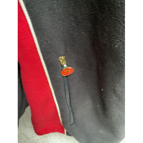 120 - TT ROAD RACING WAISTCOAT AND TT ISLE OF MAN JACKET AND  F 1 FLAG