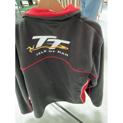 120 - TT ROAD RACING WAISTCOAT AND TT ISLE OF MAN JACKET AND  F 1 FLAG