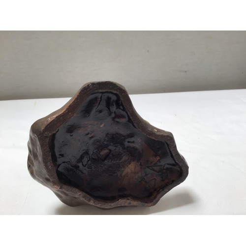 169 - METAL DOG DOOR STOP AND A SEATED LADY FIGURE