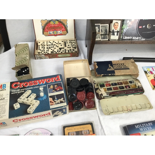 22 - BOX OF ODDS TO INCLUDE VINTAGE GAMES, BOOK STAND, STAMP ALBUMS ETC