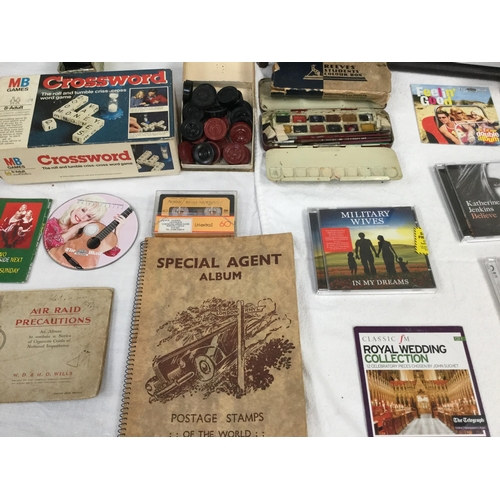 22 - BOX OF ODDS TO INCLUDE VINTAGE GAMES, BOOK STAND, STAMP ALBUMS ETC