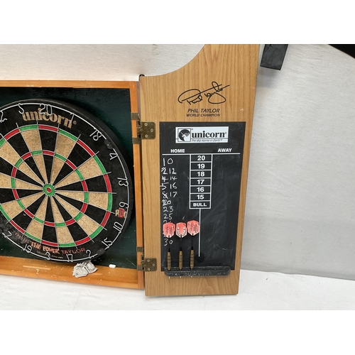 35 - DART BOARD IN CABINET 20.5 X 25