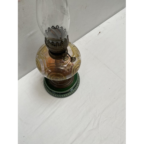 36 - VICT OIL LAMP WITH PORCELAIN BASE AND GLASS BOWL COMPLETE WITH CHIMNEY A/F         H 22