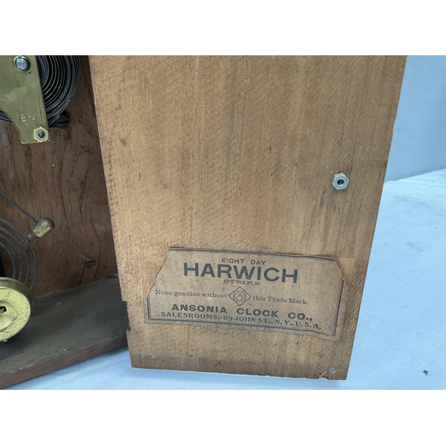 53 - EDWARDIAN MAHOGANY CASED MANTLE CLOCK WITH VISIBLE ESCAPEMENT GLASS CRACKED PENDULUM AND KEY APPEARS... 