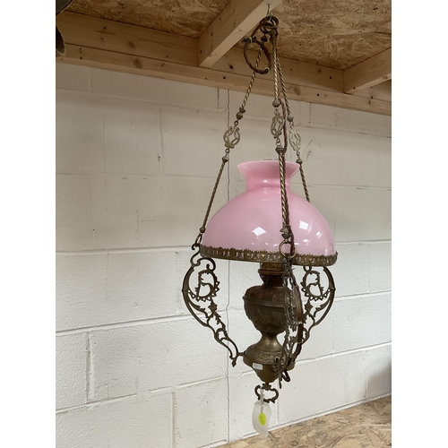 54 - VINTAGE BRASS HANGING LAMP COMPLETE WITH PINK GLASS SHADE AND CHIMNEY