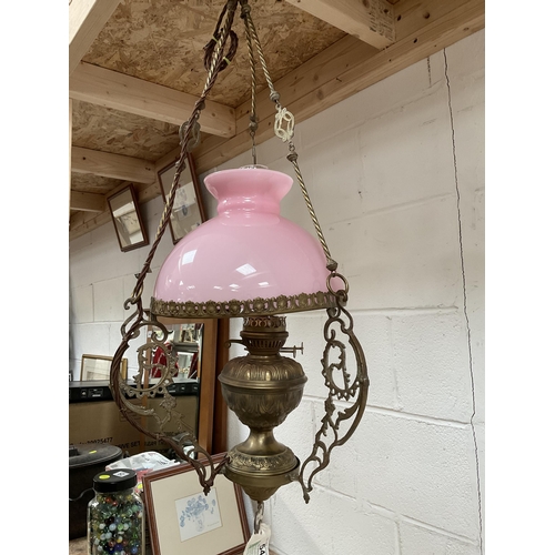 54 - VINTAGE BRASS HANGING LAMP COMPLETE WITH PINK GLASS SHADE AND CHIMNEY