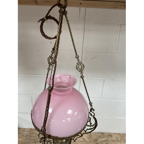 54 - VINTAGE BRASS HANGING LAMP COMPLETE WITH PINK GLASS SHADE AND CHIMNEY