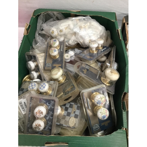 109 - 3 BOXES OF CHINA KNOBS ETC