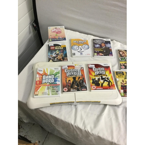 129 - WII CONSOLE GAMES AND FIT BOARD