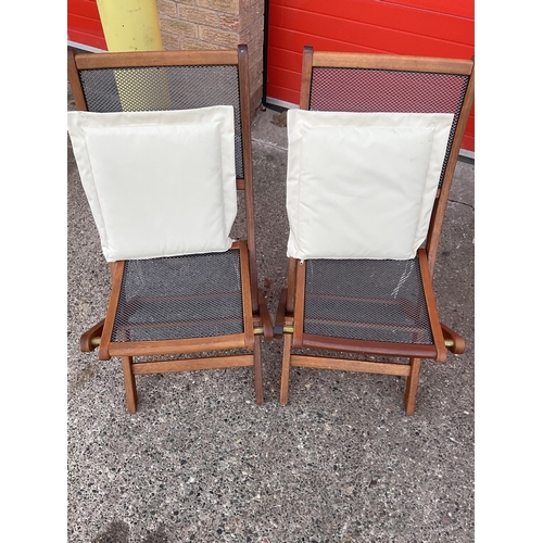 145 - 4 MATCHING GARDEN FOLDING CHAIRS WITH METAL SEATS AND BACKS COMPLETE WITH CUSHIONS AND A FOLDING DIR... 