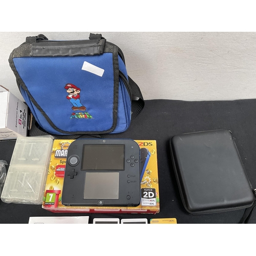 172 - NINTENDO 2 DS WITH CASE AND CARRYING BAG ETC