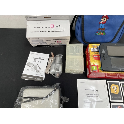 172 - NINTENDO 2 DS WITH CASE AND CARRYING BAG ETC