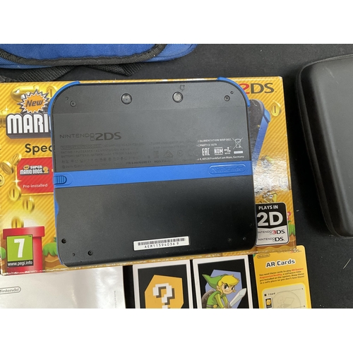 172 - NINTENDO 2 DS WITH CASE AND CARRYING BAG ETC