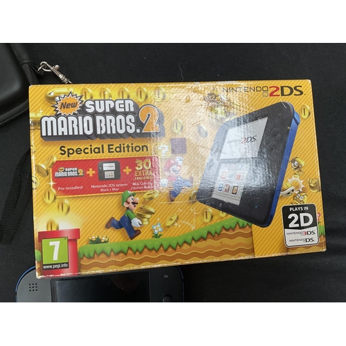 172 - NINTENDO 2 DS WITH CASE AND CARRYING BAG ETC