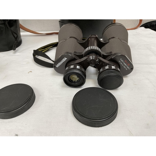 175 - PAIR OF CASED BINOCULARS AND AN OLYMPUS IS-3000 CAMERA AND LENS