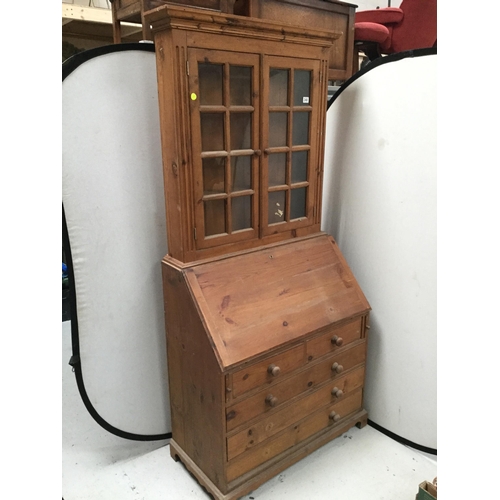 248 - WAXED PINE BUREAU BOOKCASE WITH 2 GLAZED DOORS TO TOP DROP DOWN FLAP WITH FITTED INTERIOR WITH 4 DRA... 