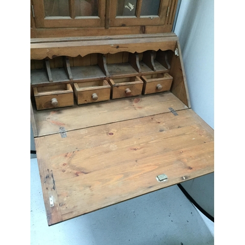 248 - WAXED PINE BUREAU BOOKCASE WITH 2 GLAZED DOORS TO TOP DROP DOWN FLAP WITH FITTED INTERIOR WITH 4 DRA... 