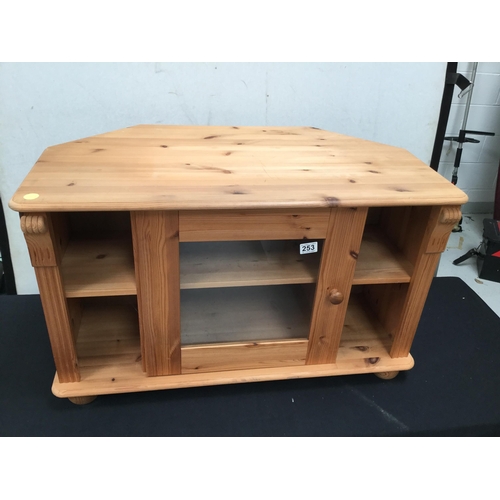 253 - MODERN PINE CORNER TV STAND WITH GLASS CENTRAL DOOR H 21