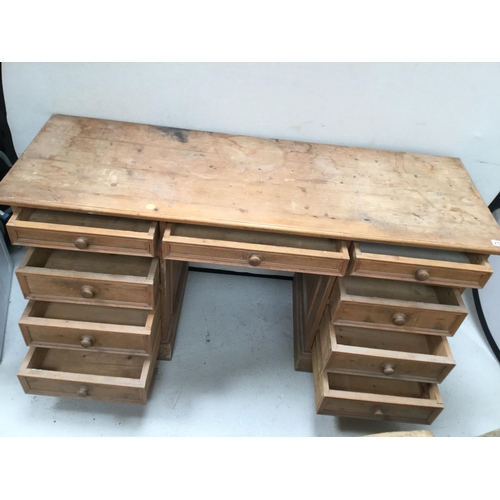 258 - WAXED PINE TWIN PEDESTAL KNEE HOLE DESK OF 9 DRAWERS A/F H 30