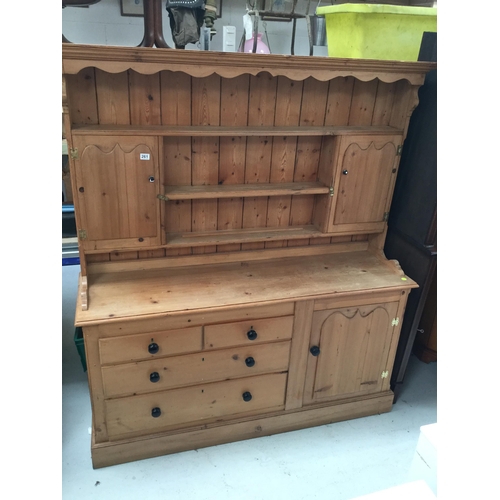 261 - RECLAIMED PINE KITCHEN DRESSER, RACK- WITH SHAPED FREEZE OVER OPEN SHELVES FLANKED BY 2 PANELLED DOO... 