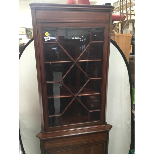 262 - EDWARDIAN MAHOGANY INLAID DOUBLE CORNER CUPBOARD WITH ASTRICAL GLAZED DOOR OVER SINGLE DOOR TO BASE ... 