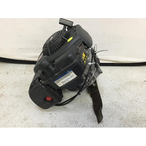 283 - BRIGGS AND STRATTON 300 E PETROL ENGINE WITH MOWER BLADE