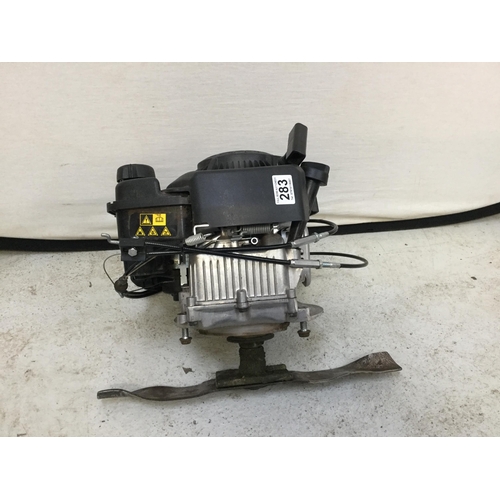 283 - BRIGGS AND STRATTON 300 E PETROL ENGINE WITH MOWER BLADE