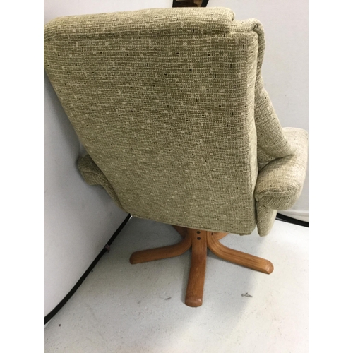 295 - GREEN FABRIC SWIVEL AND RECLINING CHAIR COMPLETE WITH FOOTSTOOL