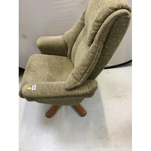 295 - GREEN FABRIC SWIVEL AND RECLINING CHAIR COMPLETE WITH FOOTSTOOL