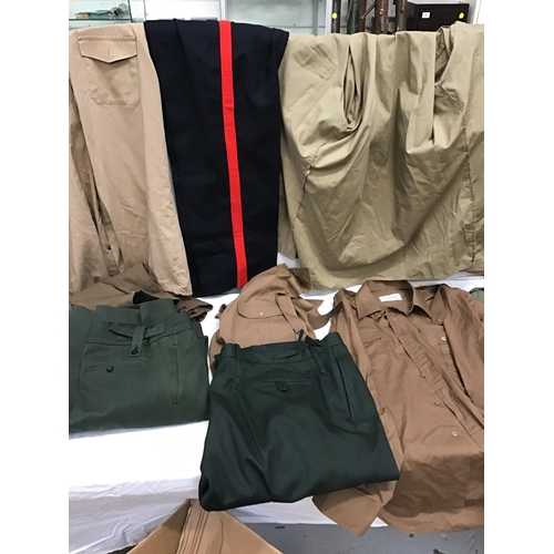 320 - BOX OF MILITARY CLOTHING/UNIFORM