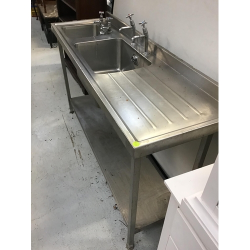 323 - COMMERCIAL STAINLESS STEEL DOULBLE SINK AND DRAINER ON STAND H 36