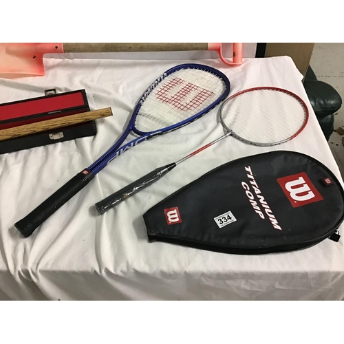 334 - QTY OF SPORTS RACKETS CUES ETC