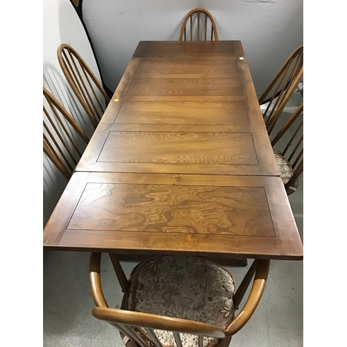 337 - BADGED ERCOL DRAWER LEAF DINING TABLE WITH REFECTORY STYLE STRETCHERED BASE AND 6 MATCHING ERCOL CHA... 