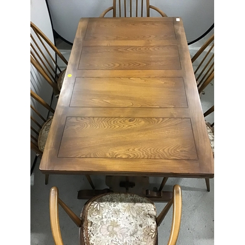 337 - BADGED ERCOL DRAWER LEAF DINING TABLE WITH REFECTORY STYLE STRETCHERED BASE AND 6 MATCHING ERCOL CHA... 