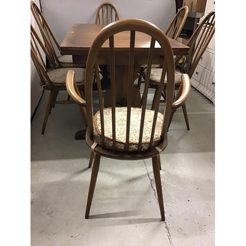 337 - BADGED ERCOL DRAWER LEAF DINING TABLE WITH REFECTORY STYLE STRETCHERED BASE AND 6 MATCHING ERCOL CHA... 